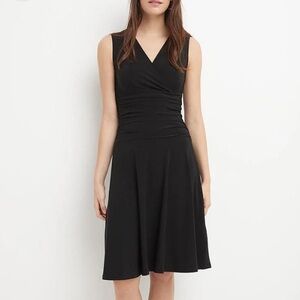 Form fitting sleeveless dress with tummy control